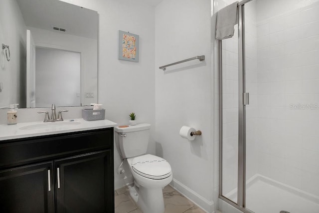 bathroom featuring baseboards, toilet, a stall shower, marble finish floor, and vanity