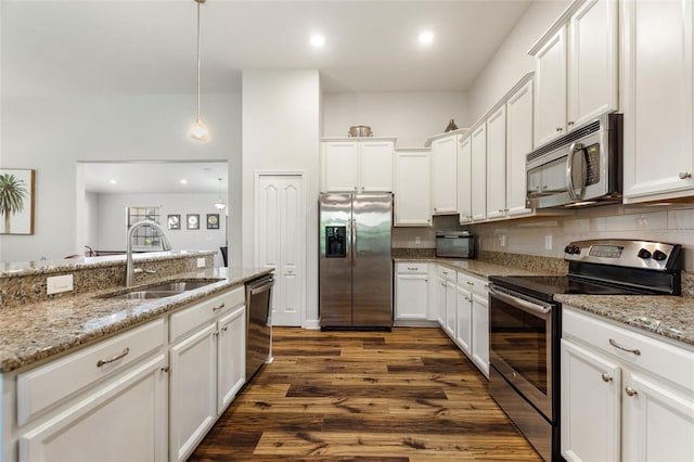 kitchen featuring white cabinetry, appliances with stainless steel finishes, and a sink