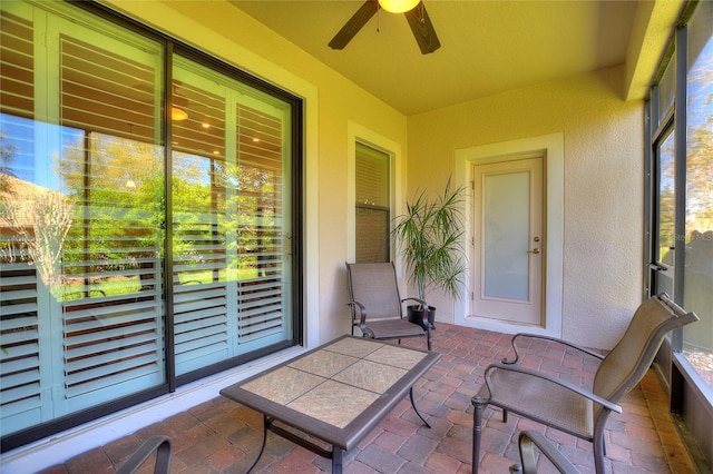 view of patio with a ceiling fan