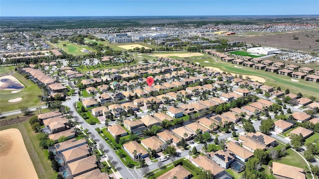 bird's eye view with a residential view and golf course view