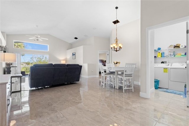 living area featuring baseboards, independent washer and dryer, marble finish floor, high vaulted ceiling, and ceiling fan with notable chandelier