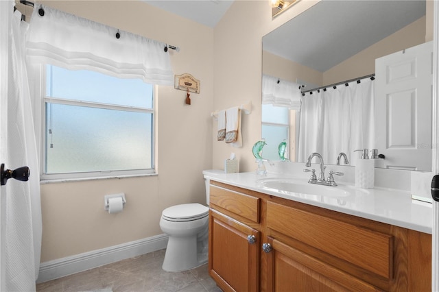 full bathroom with baseboards, vanity, toilet, and a healthy amount of sunlight