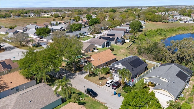 aerial view featuring a water view and a residential view