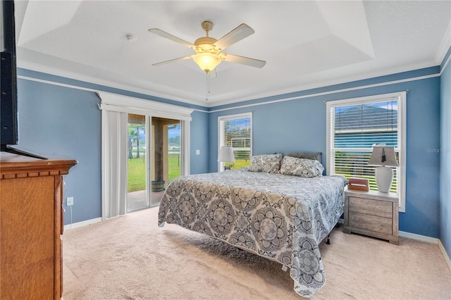 bedroom featuring access to exterior, carpet flooring, and baseboards