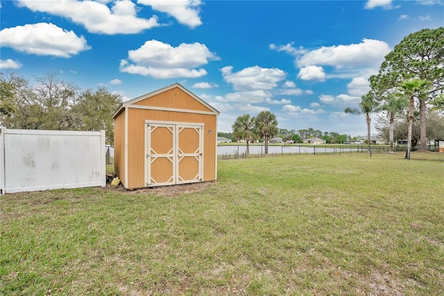 view of shed featuring a fenced backyard