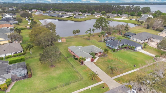 aerial view with a residential view and a water view