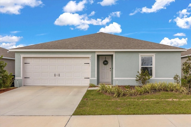 ranch-style house featuring a garage, roof with shingles, and stucco siding