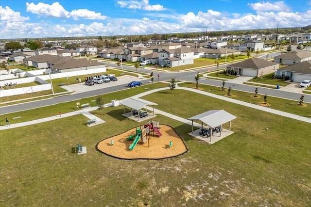 view of community featuring playground community and a residential view