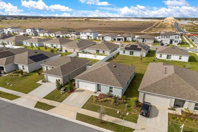 drone / aerial view with a residential view