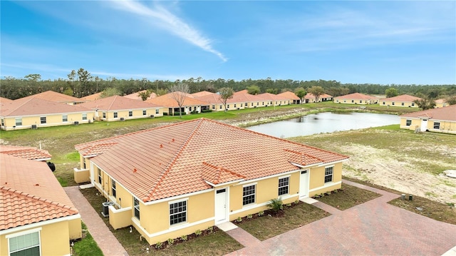 aerial view featuring a residential view and a water view