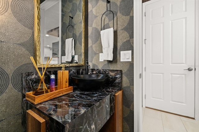 bathroom with tile patterned floors and vanity