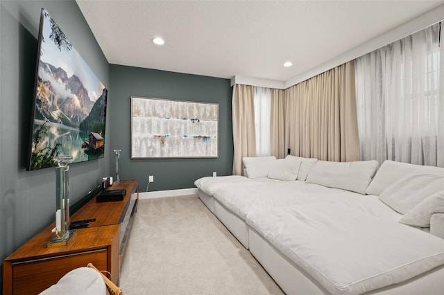 bedroom with recessed lighting, baseboards, and carpet flooring