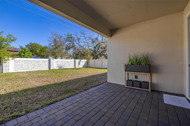 view of patio featuring a fenced backyard