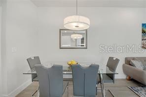 dining room featuring baseboards