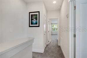 corridor with baseboards