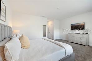 bedroom featuring carpet flooring