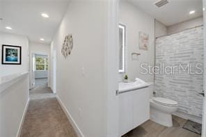 interior space featuring recessed lighting, visible vents, and baseboards