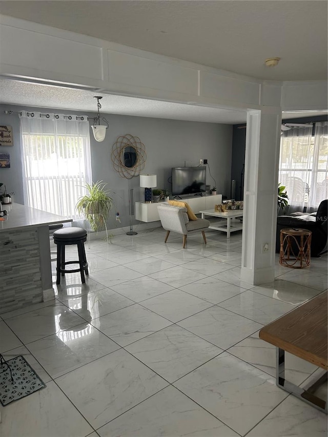 unfurnished dining area with marble finish floor