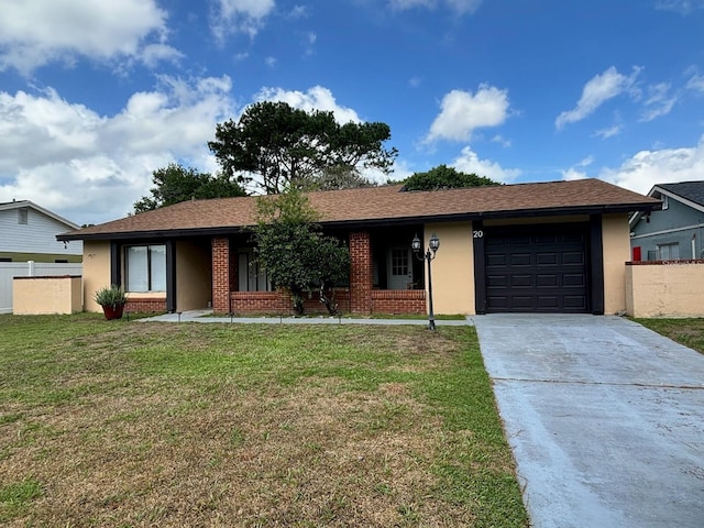 ranch-style house with brick siding, concrete driveway, an attached garage, a front yard, and fence