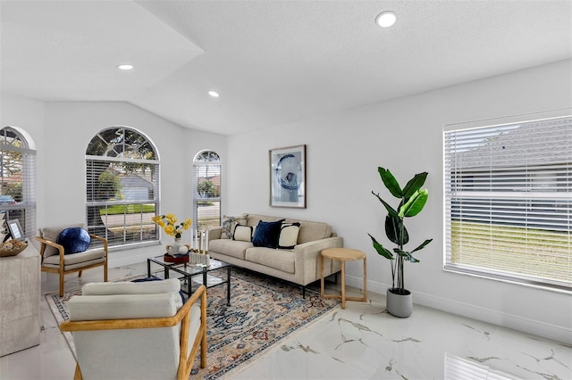 living area with lofted ceiling, a textured ceiling, recessed lighting, baseboards, and marble finish floor