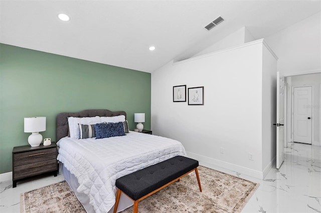 bedroom featuring lofted ceiling, marble finish floor, baseboards, and visible vents