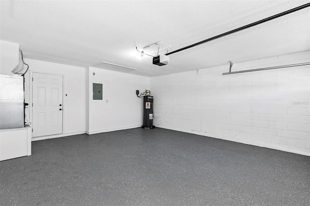 garage featuring concrete block wall, electric panel, a garage door opener, and electric water heater