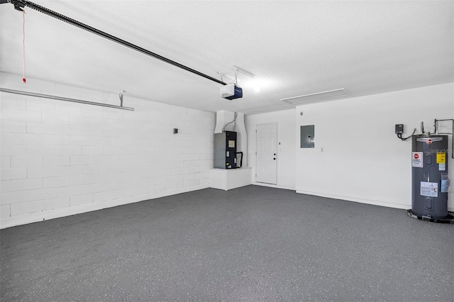 garage featuring concrete block wall, electric panel, a garage door opener, heating unit, and water heater