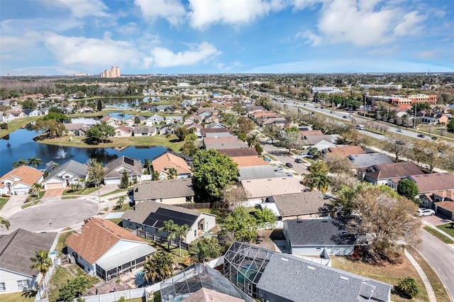 aerial view featuring a residential view and a water view