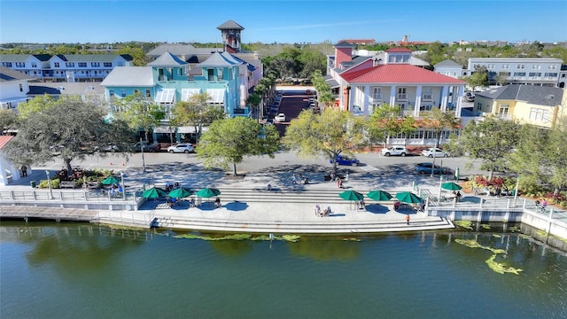 aerial view featuring a residential view and a water view