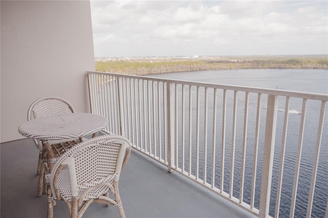 balcony featuring a water view