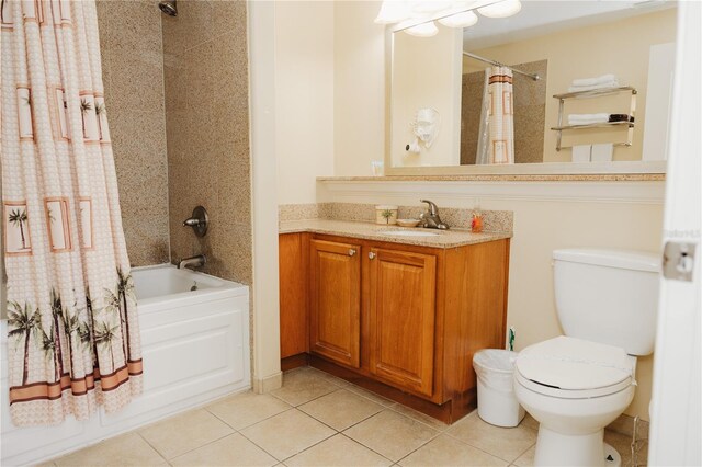 full bath featuring tile patterned flooring, toilet, vanity, and shower / bath combo