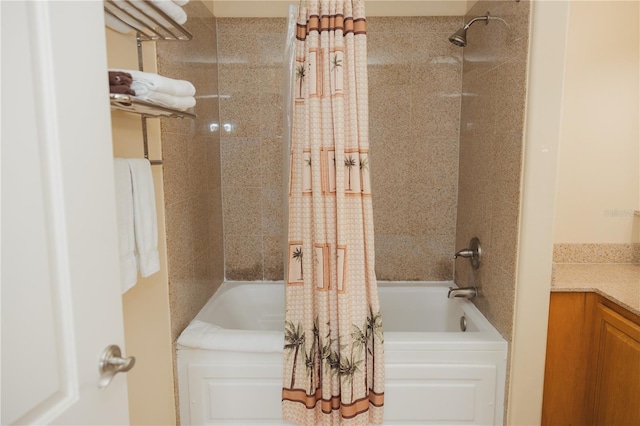 full bath featuring shower / bath combo with shower curtain and vanity