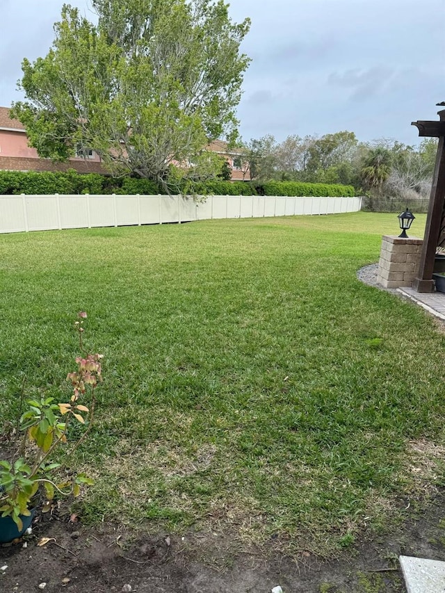 view of yard with fence