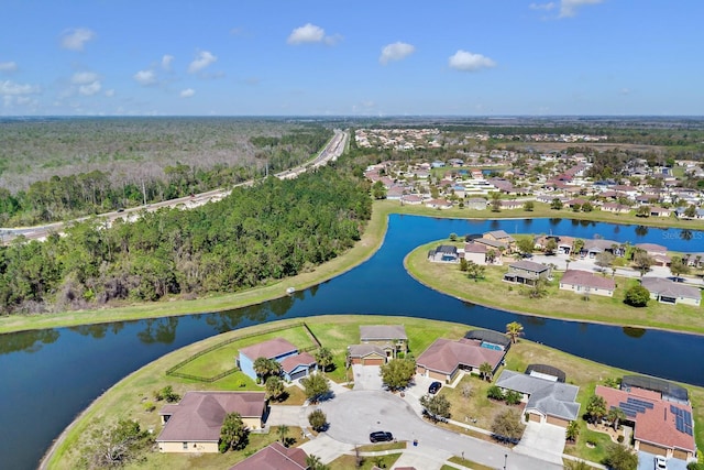 aerial view with a residential view and a water view