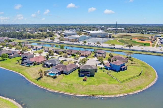 aerial view with a water view and a residential view