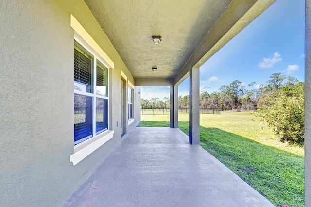 view of patio / terrace featuring fence