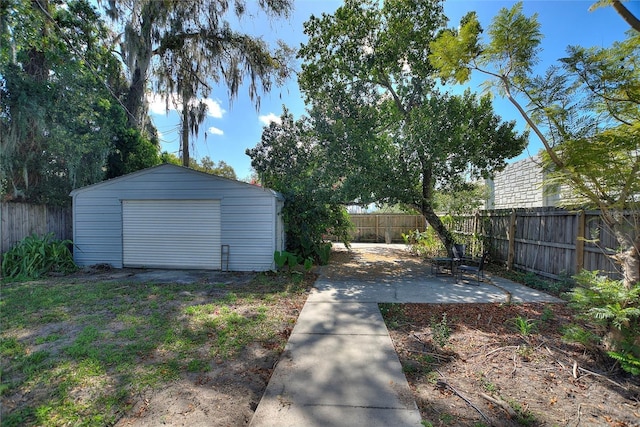 detached garage with fence