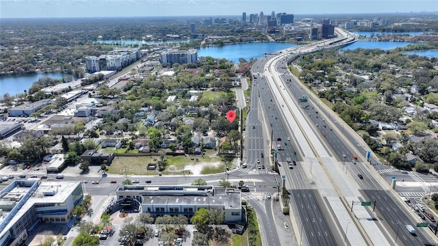 drone / aerial view with a water view and a city view