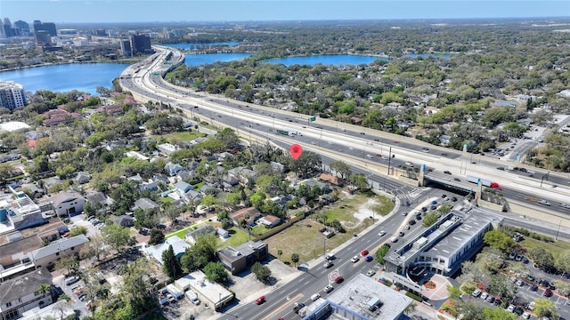 birds eye view of property with a water view