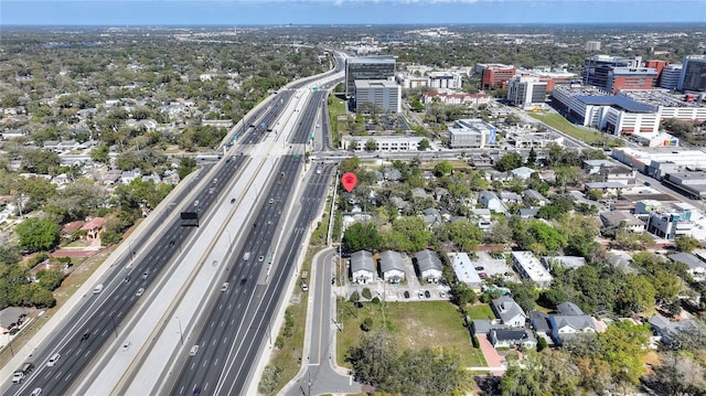 drone / aerial view featuring a city view