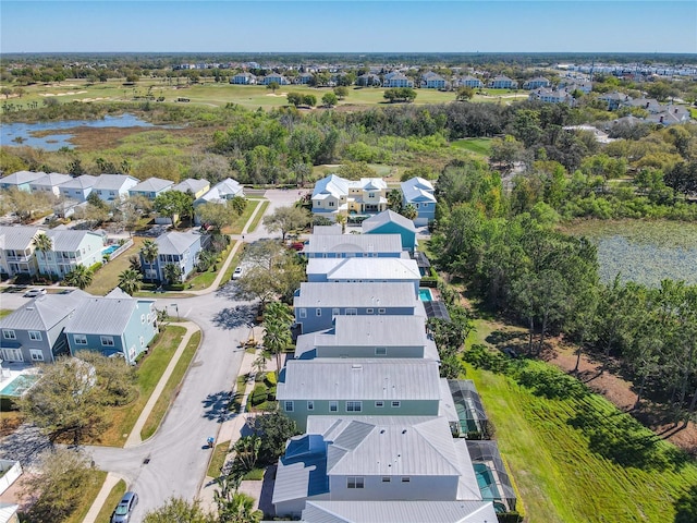 aerial view with a water view and a residential view