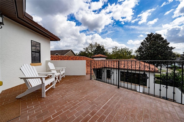 view of patio with a balcony