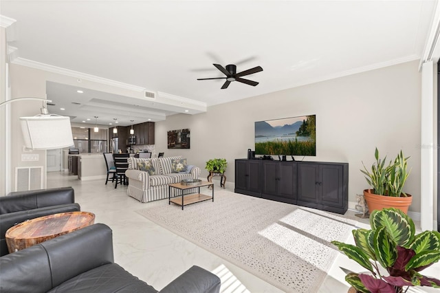 living area featuring a ceiling fan, marble finish floor, visible vents, and crown molding