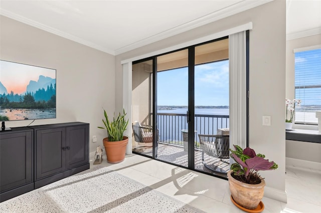 interior space with a water view, baseboards, and ornamental molding