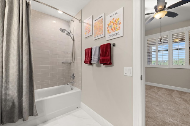 full bathroom with shower / bathtub combination with curtain, baseboards, and a ceiling fan