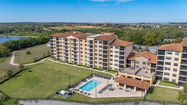 birds eye view of property featuring a water view