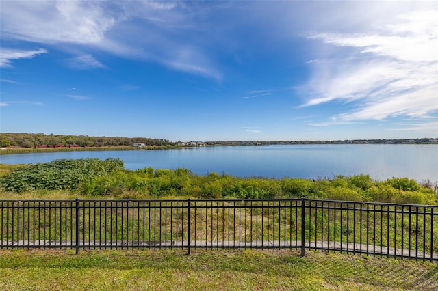 view of water feature featuring fence