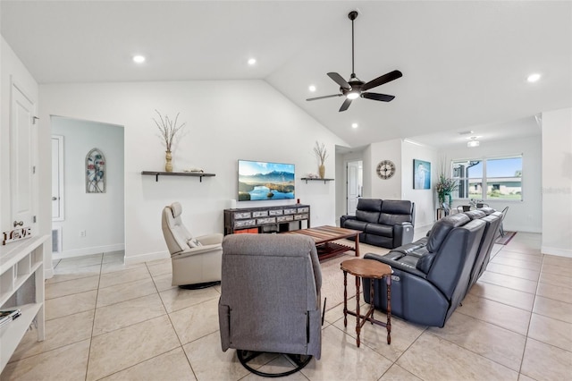 living area featuring lofted ceiling, recessed lighting, and light tile patterned flooring