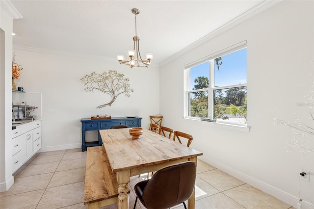 dining space featuring light tile patterned floors, ornamental molding, a chandelier, and baseboards