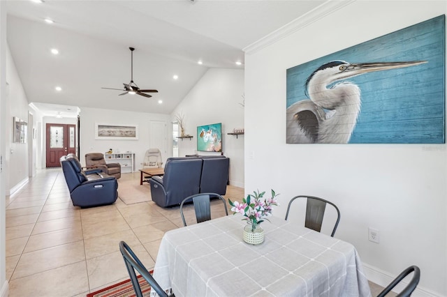 dining area featuring baseboards, ceiling fan, tile patterned flooring, vaulted ceiling, and recessed lighting